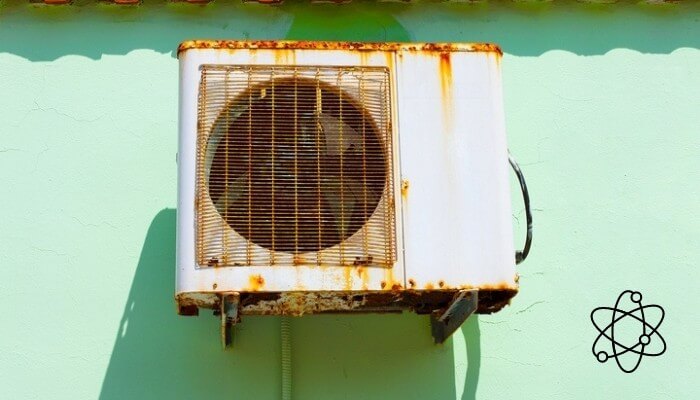 old rusted aircon outdoor unit